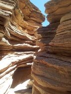 photo of two layered mountains in canyon