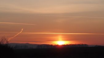 landscape of bright setting sun on the horizon line