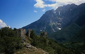 mountain castle in ruins landscape