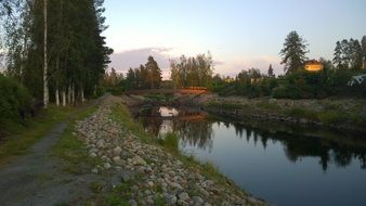 wooden bridge across calm river