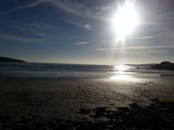 bright sun at sunset over the beach