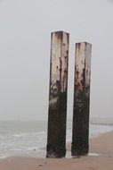 metal poles on the beach