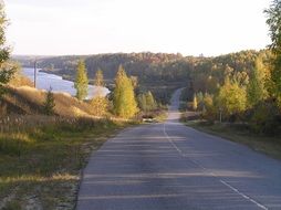 Beautiful Landscape of autumnal forest and road
