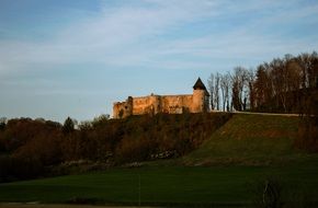 historic castle on a hill at dusk