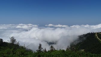 clouds above the top of the mountain in georgia
