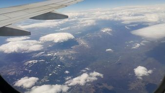 view of earth through the clouds