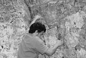 man climbs the mountains