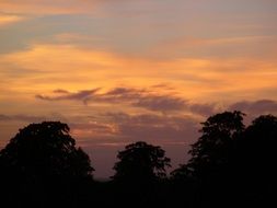 glow of sunset in the clouds of the evening sky