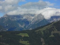 landscape of fog and clouds over the mountains in Tyrol