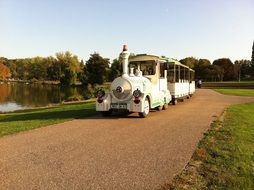 Tourist transport in a park near the lake