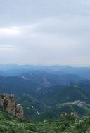 blue mist over the tops of the mountains