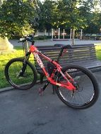 bicycle near the benches in the park