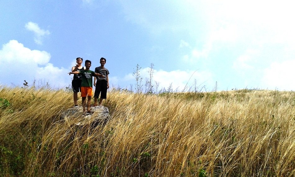 friends on a hill in indonesia