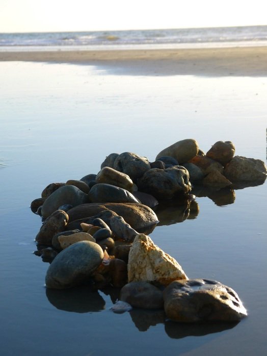 row of stones in the sea