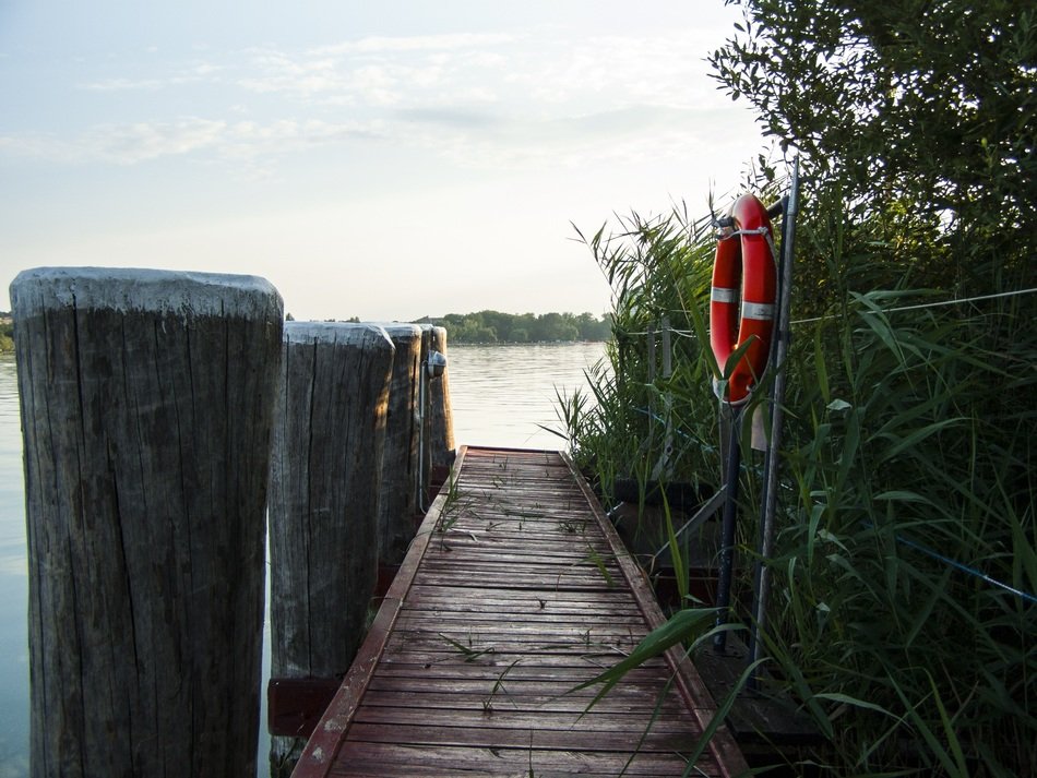 wooden walkway to a beautiful lake