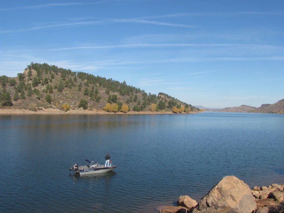 landscape of fishing on lake in summer