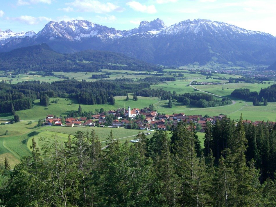 panoramic view village in valley at aggenstein mountain, austria, ostallgÃ¤u