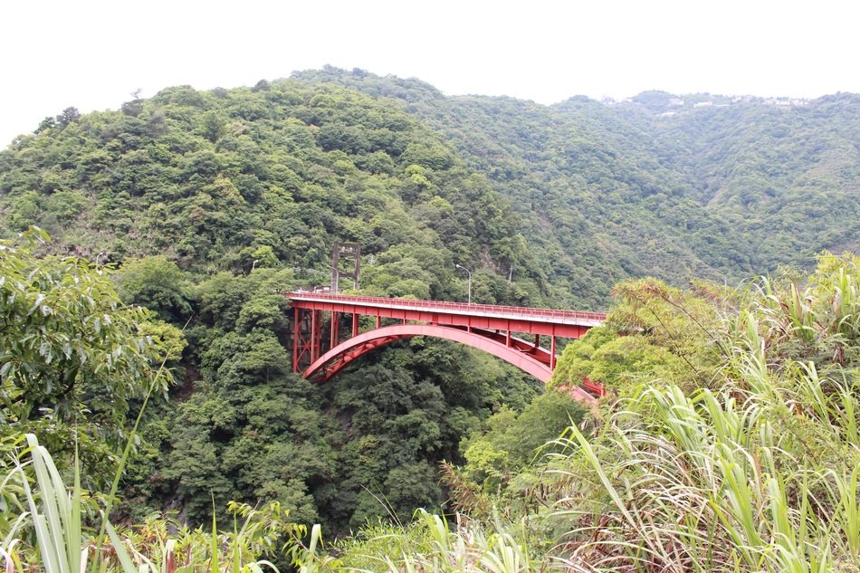 Red Bridge in the background of the picturesque hills