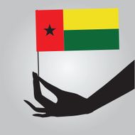 Hand with flag Guinea-Bissau