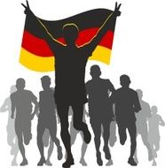 Athlete with the Germany flag at finish