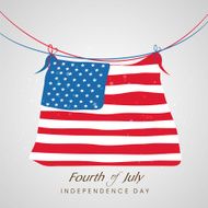 Hanging national flag with text Fourth of July