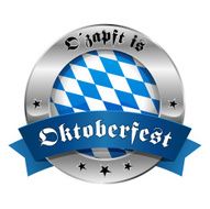 Round oktoberfest button with ribbon and text