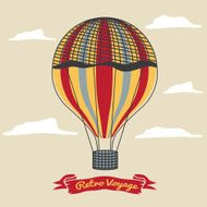 Vintage hot air balloon in the sky with clouds