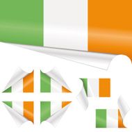 Irish Flags behind Curled Paper
