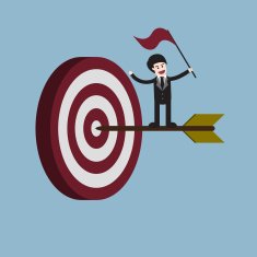 target with arrow and businessman holding flag