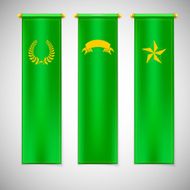 Vertical green flags with emblems