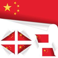 Chinese Flags behind Curled Paper