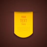 Yellow advertising sticker on brown background