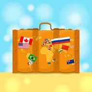 Suitcase with world map and flags