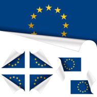 European Flags behind Curled Paper