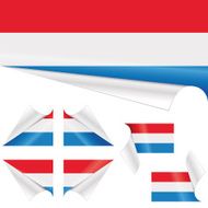 Dutch Flag behind Curled Paper