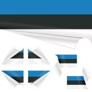 Estonian Flags behind Curled Paper