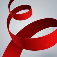 Red fabric curved ribbon on grey background N4