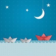 paper boats sailing at night