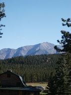 rustic barn in mountains scenery