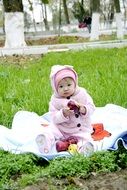 baby on a picnic in the park