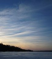 winter over the lake at sunset