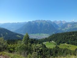 alpine mountains with green trees in austria