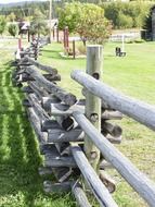 wooden fence on a field