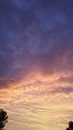 thick clouds in the sky at sunset