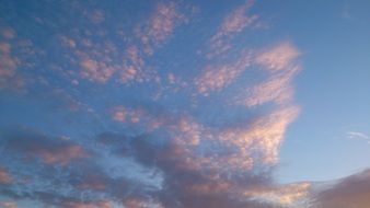 Clouds in the clear sky at dusk
