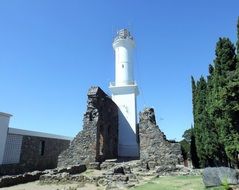 white lighthouse on a sunny day