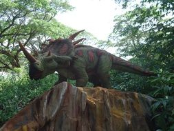 wonderful dinosaur triceratops statue in park