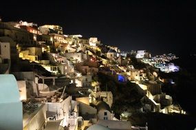 night city on a hill in Santorini, Greece