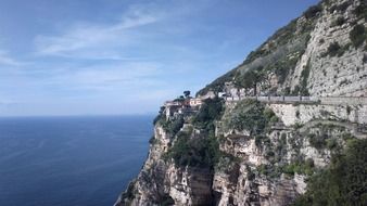 remote view of a mountain road in italy on a sunny day