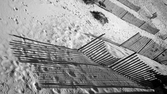 Black and white photo of the sand on the beach in Alabama